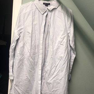 Long sleeved white button down blouse
